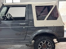 SUZUKI SIERRA WHITE SOFT TOP W/ DARK TINT WINDOWS